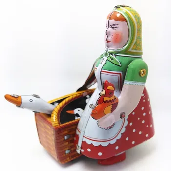 [Smieklīgi] [Jauns] Klasisks kolekcija Retro Pulksteņa Vēja Metāla Kājām Skārda lauksaimnieks robots sieviete ar zosu Mehāniskās rotaļlietas, dāvanu